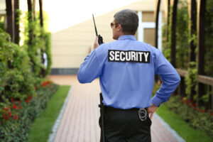 Security guard protecting outdoor property